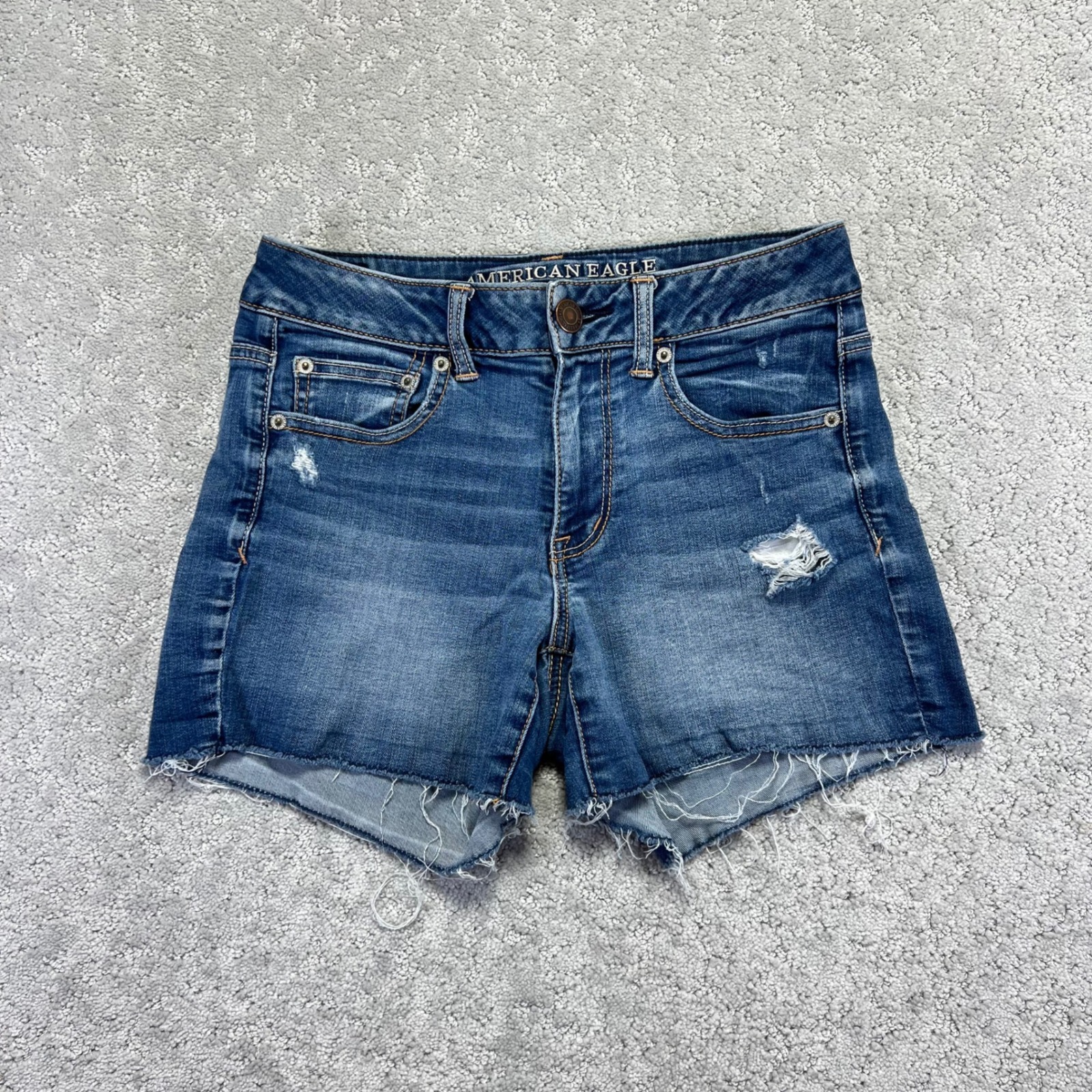 American Eagle Denim Shorts Size 4 Hi-Rise Shortie Blue Denim Distressed Stretch